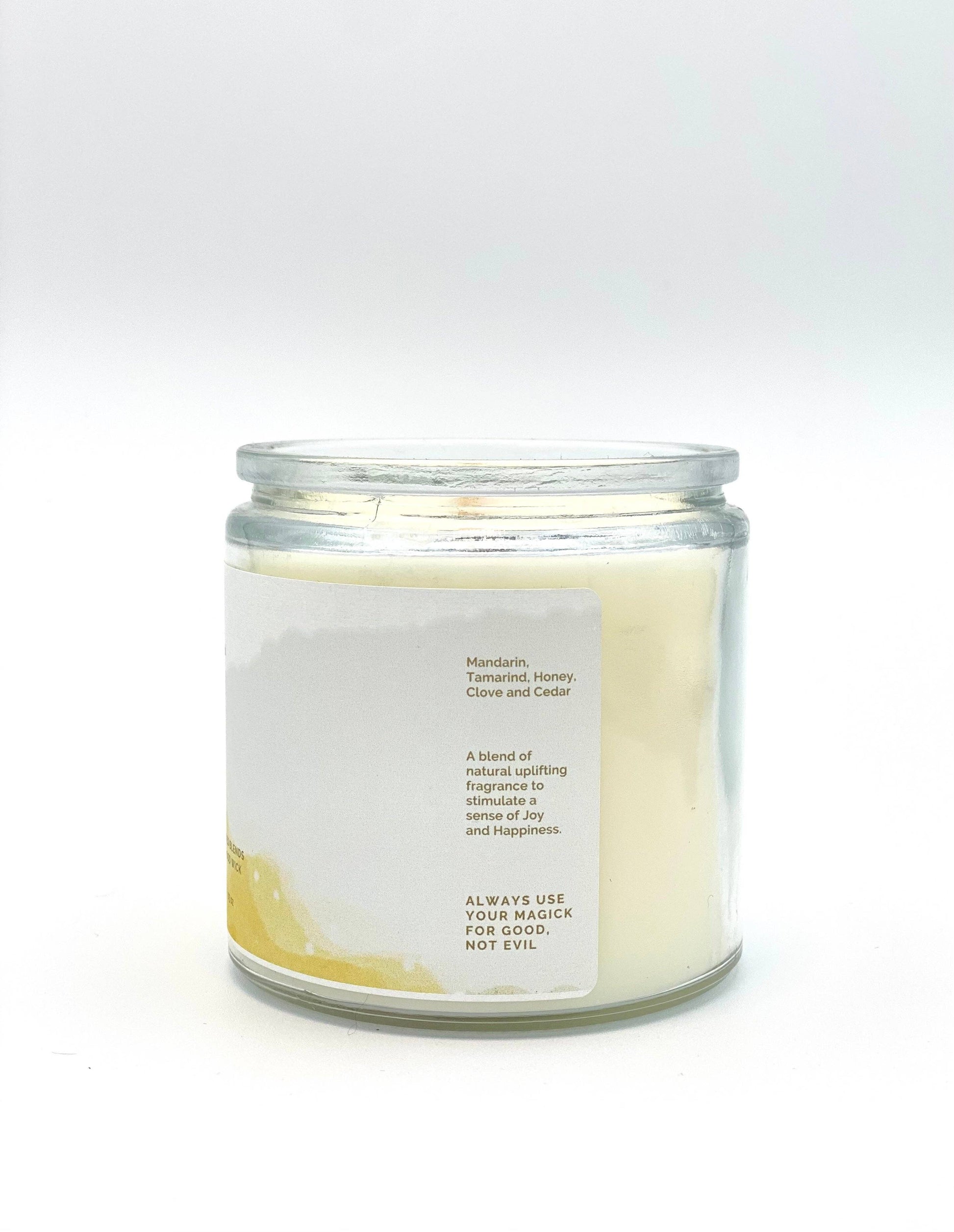 Glass candle with a white label on a white background