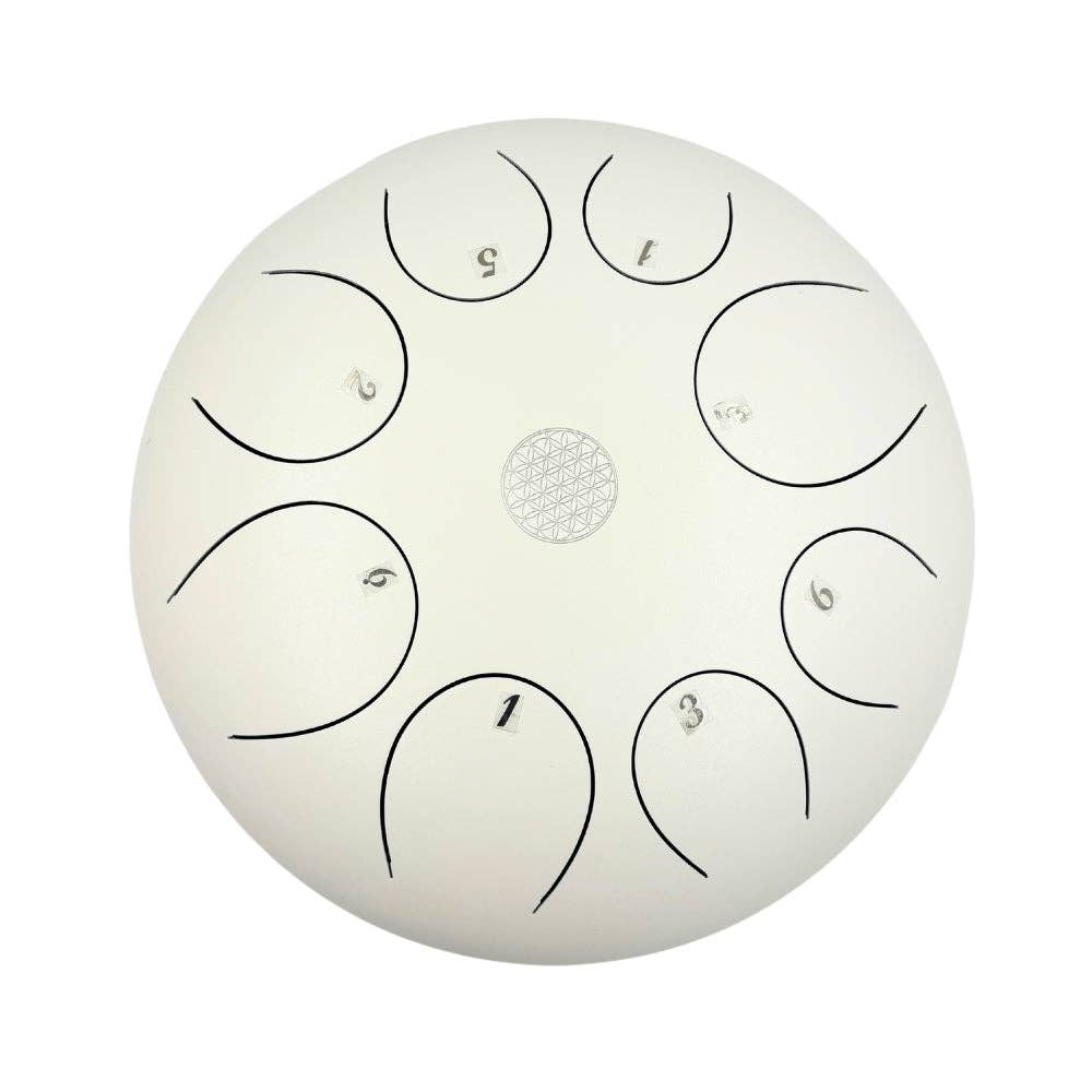 White steel tongue drum with black markings on a white background