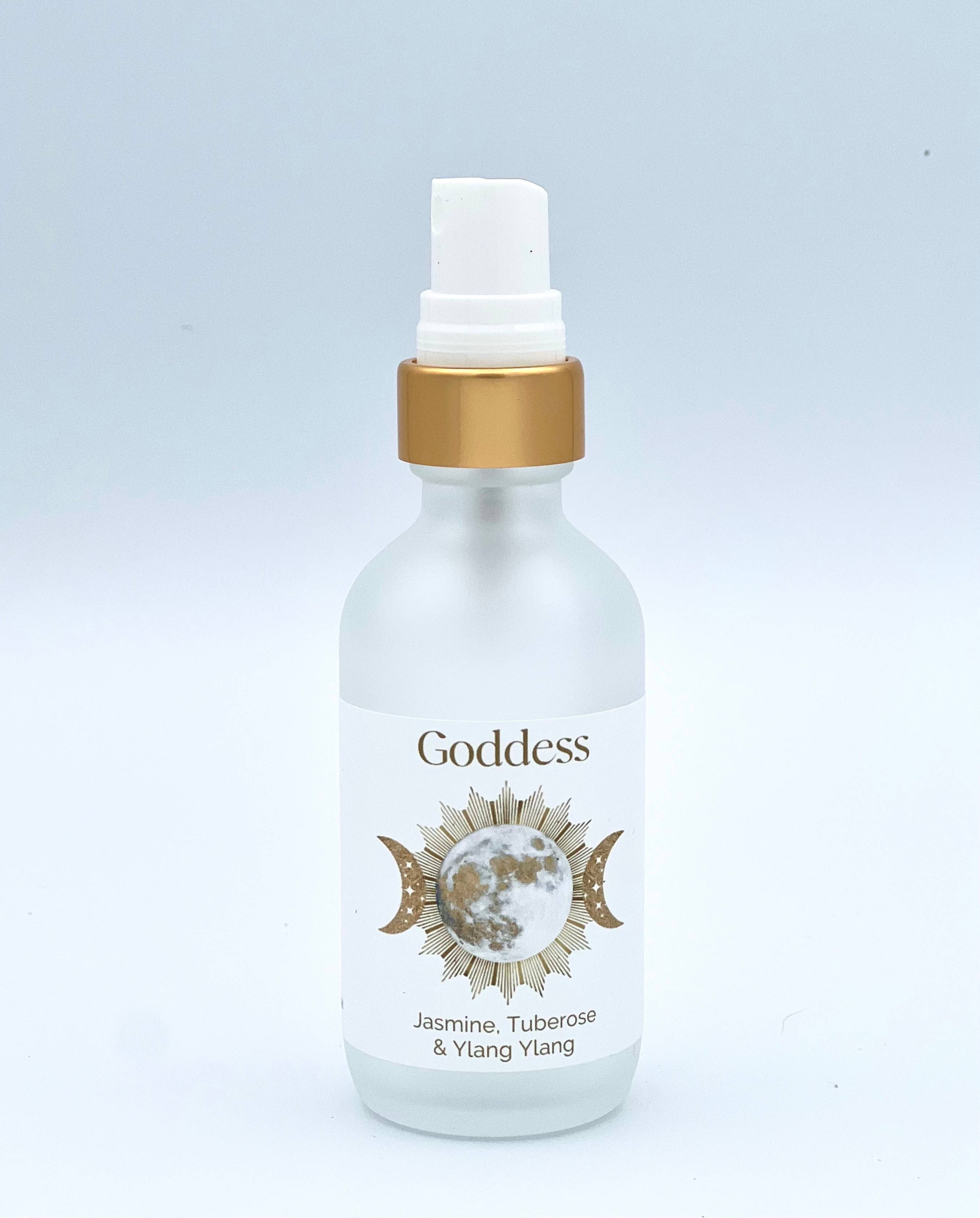 White bottle with gold cap labeled 'Goddess' on a light gray background