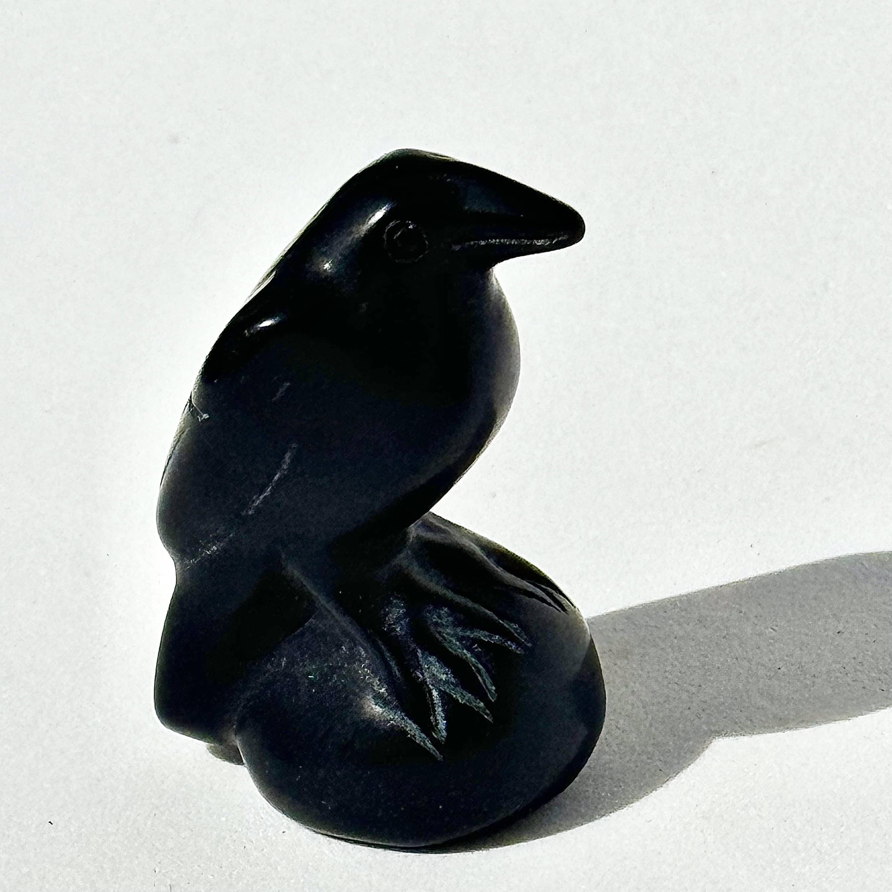 BLACK OBSIDIAN RAVEN CARVING - represent ancient wisdom, intelligence, and transformation - Obsidian is lustrous volcanic glass - excellent protective stone - external energies and protecting - against negativity - negative vibrations in the environment - clarity in healing - Joy - Journey of you