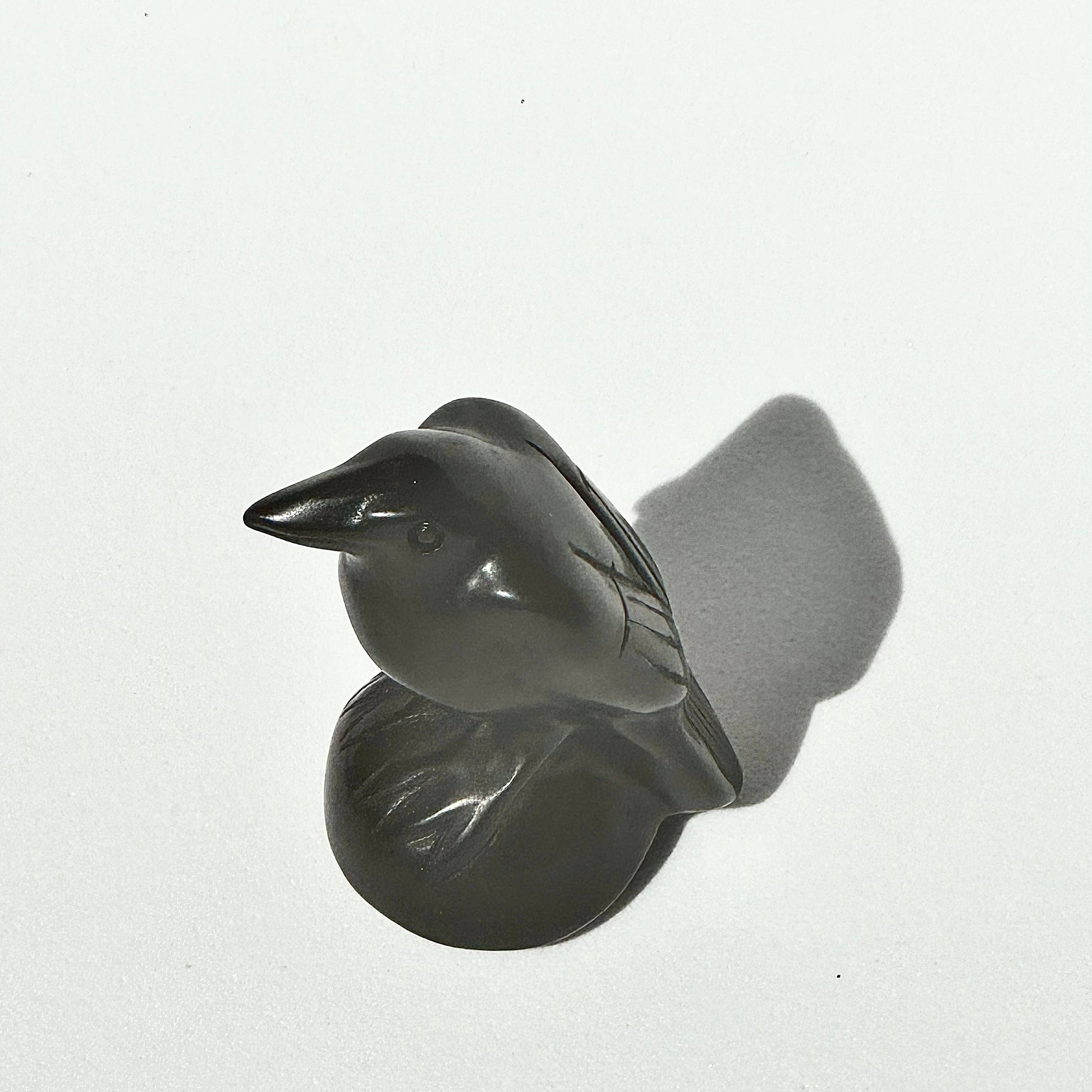 BLACK OBSIDIAN RAVEN CARVING - represent ancient wisdom, intelligence, and transformation - Obsidian is lustrous volcanic glass - excellent protective stone - external energies and protecting - against negativity - negative vibrations in the environment - clarity in healing - Joy - Journey of you