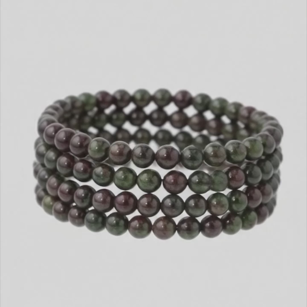 Load video: dragons blood stretch bracelet
