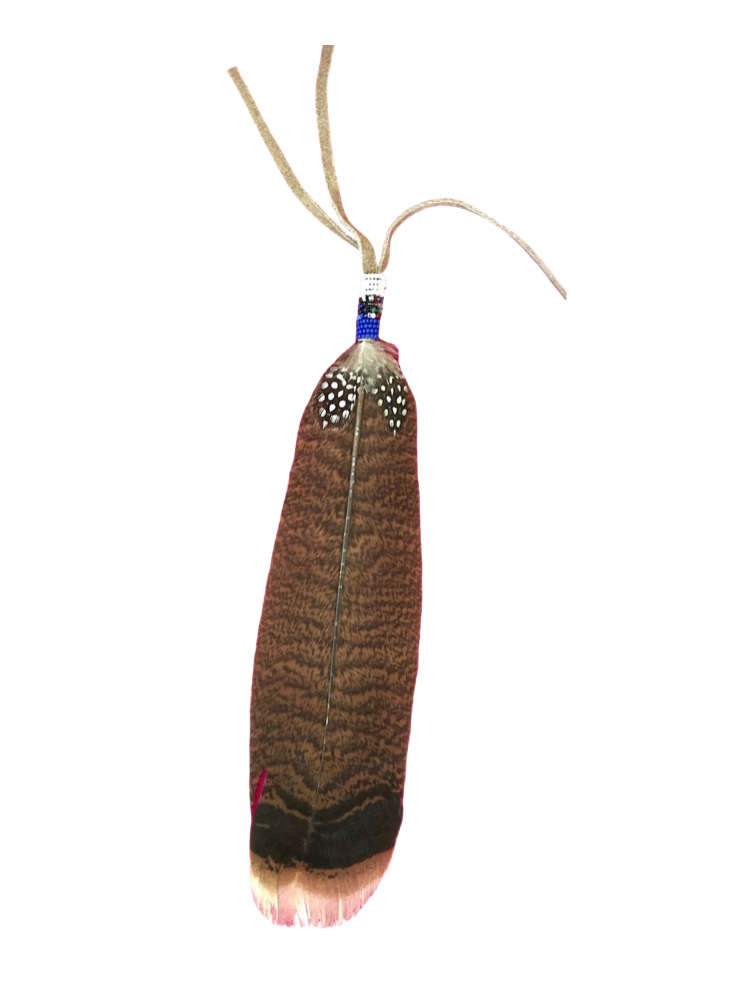 A handcrafted beaded turkey wing feather, primarily brown in color with a beaded pattern near the base, used for smudging rituals - JOY - Journey Of You - Spiritual, Holistic, Empowering